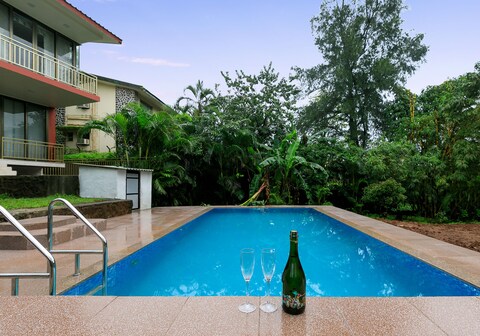 StayVista at Pura Vida - A hill-view villa with Modern interiors & Swimming pool