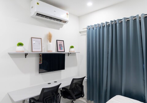 X90 Studio Apartments