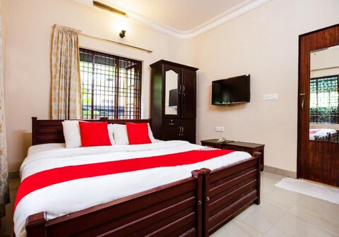 Malgudi Holidays Apartment | Rooms & Kitchen