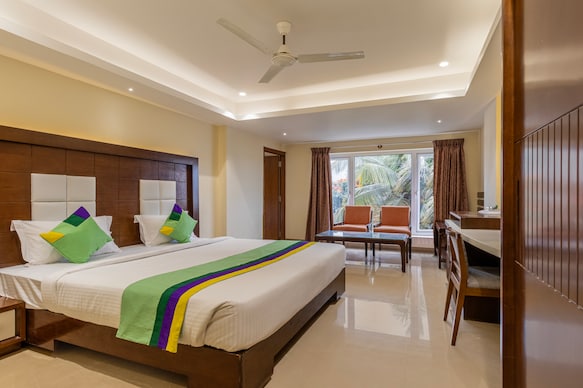 Treebo Suvarna Comforts