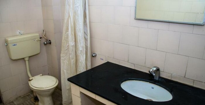 Sri Sai Residency-Suite Washroom1