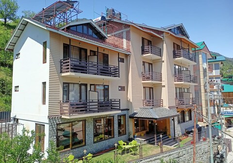 Snow Paradise - Pure Veg Hotel
