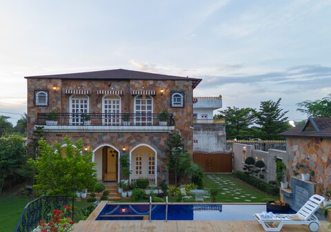 Fancy 6 BHK Villa with Pool Surrounded by Lush Greenery