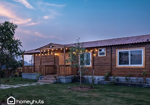 Luxury Wood House with Pool by Homeyhuts | 3BR