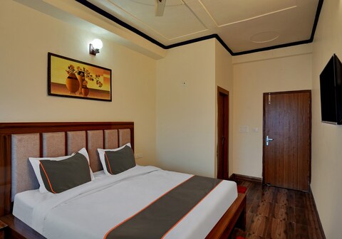 Collection O Trihans Mantion Hotel