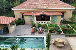 Caju Grove  The Big Yellow Goan House, Goa Caju Grove  The Big Yellow Goan House, Goa