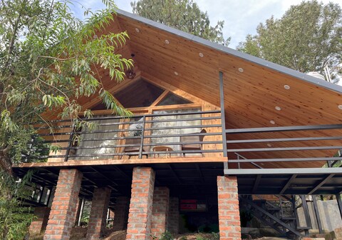 Rustic Cabin with Hill View | WanderNest