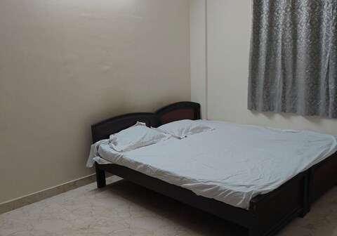 Visitors Lounge by MMG - 2BHK in Paramount Hills