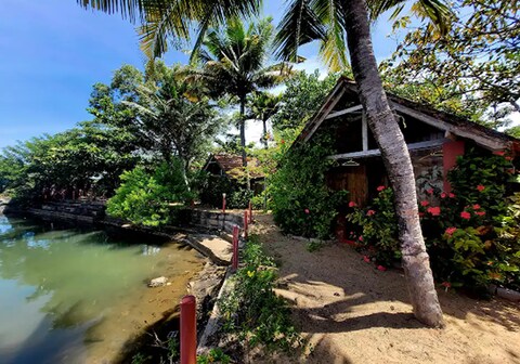 Waterfront bungalow by Ayushkamy