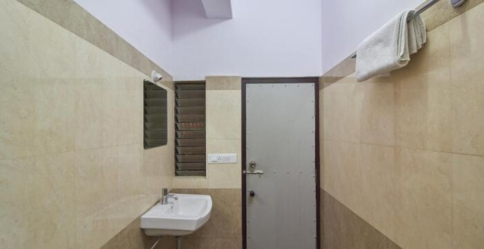 Olive Residency-deluxe non ac room bathroom 2