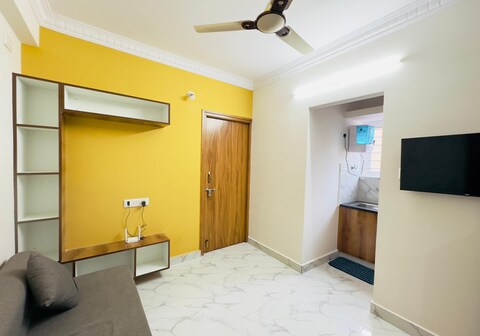 Compact Sarjapur Apartment by ANI living Spaces