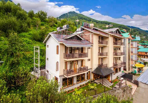 Snow Paradise - Pure Veg Hotel