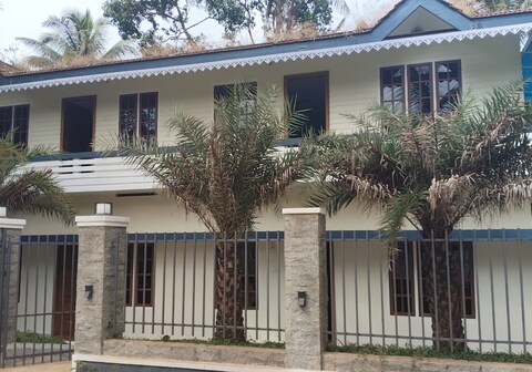 Porte De Munnar Family Cottage