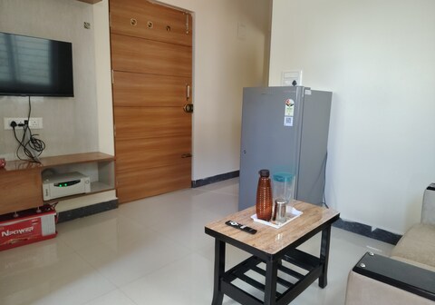 The cave Lakeview suits 1BHK