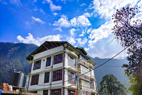 RUFINA BLUE PINE A Pure Veg Hotel