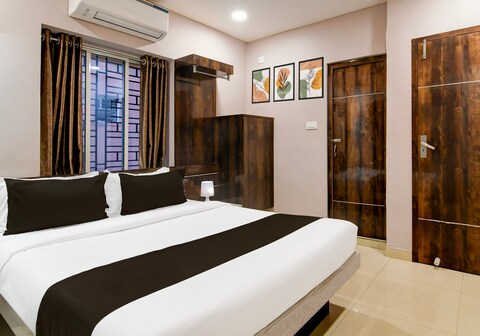 Super Collection O New Town Near OM Sweets Formerly Shiva Inn