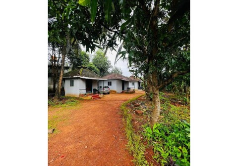 Swarnagandha cottages and Family Rooms