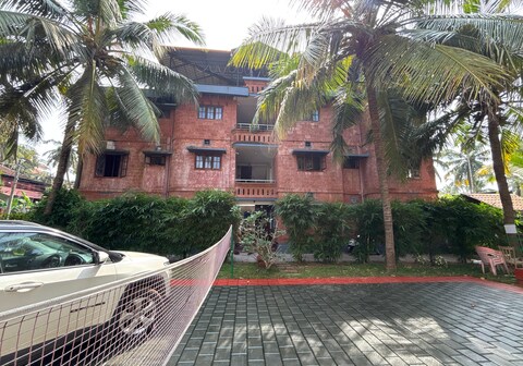 Malgudi Holidays Apartment | Rooms & Kitchen