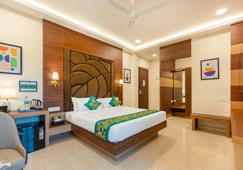 Treebo Premium Pine Tree Courtyard
