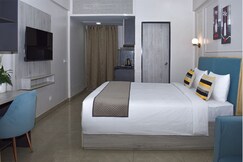 Modern Studio with kitchenette & cozy seating, Jaipur Modern Studio with kitchenette & cozy seating, Jaipur