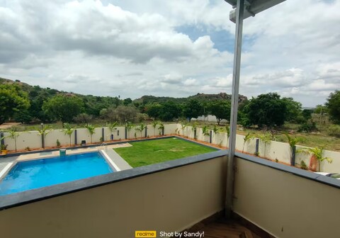 Serene Stay 4BHK FarmVilla | Pool | Lawn | BBQ | Events By AweNest