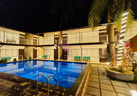 Beach Walk Resort Morjim by Feather Touch