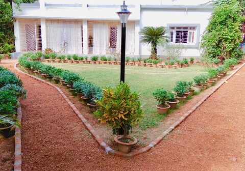 Nibhriti | Rooms & Caretaker