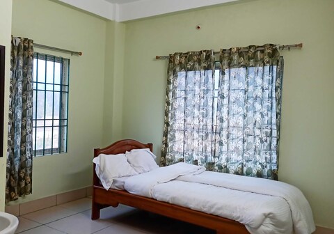 SPOT ON Sunrise Lodge & Axomiya Dhaba