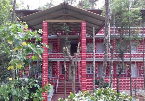 River Near Coorg | Rooms & Restaurant