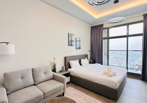 Upscale Apartment at Oval Tower Near Downtown with Balcony and Parking by Belvilla