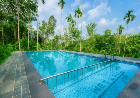 Wetlands Wayanad Pool Resort near Natural Waterfalls