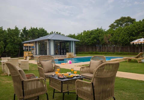 ELIVAAS 5-BHK with Luxe Mudhouses, Tents, Pond & Pvt Pool | Kaimalgarh Farmstay