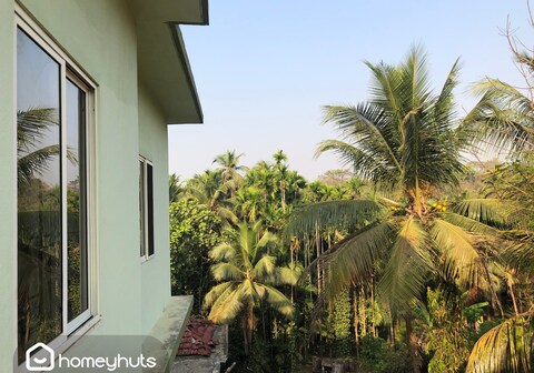 Palms and Paradise | Cozy 1BR Apartment | Near Morjim Beach | Goa | by Homeyhuts