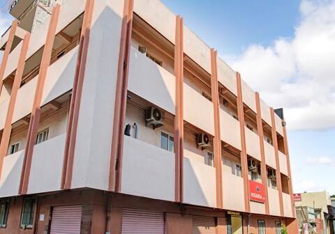 Nisarga Inn, KR Puram Railway Station