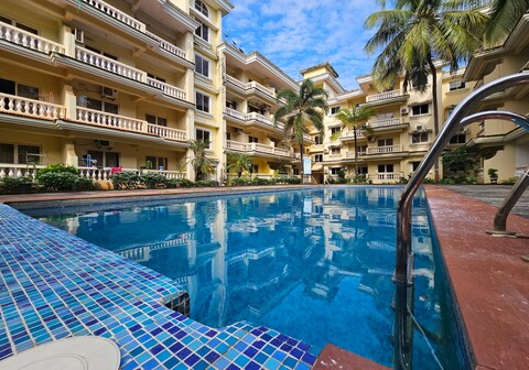 Seashell Serenity Poolside 2BHK Retreat