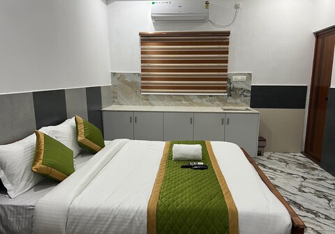ENKE SUITES | 10 min to infopark kakkanad