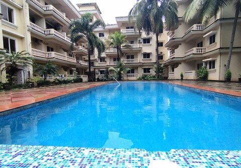 Seacoast Retreat Lovely 2 BHK Condo With Pool Near The Beach