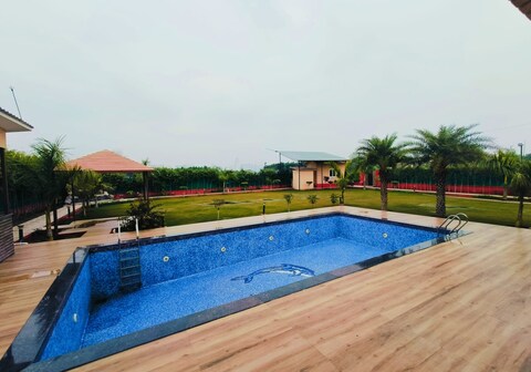 NF27 2bhk luxury farm house big pool party relax by instay