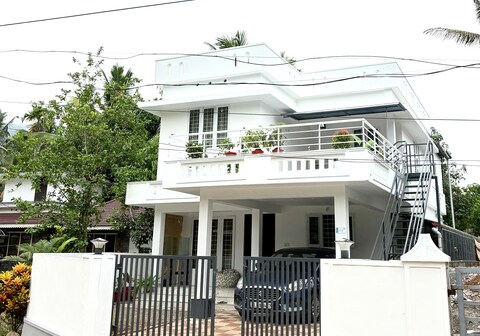 Thoppil John's Villa