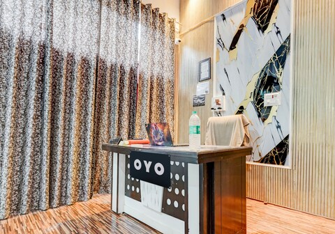 Hotel O Flagship Siddharth Hotel Yamuna Vihar C Block Stand