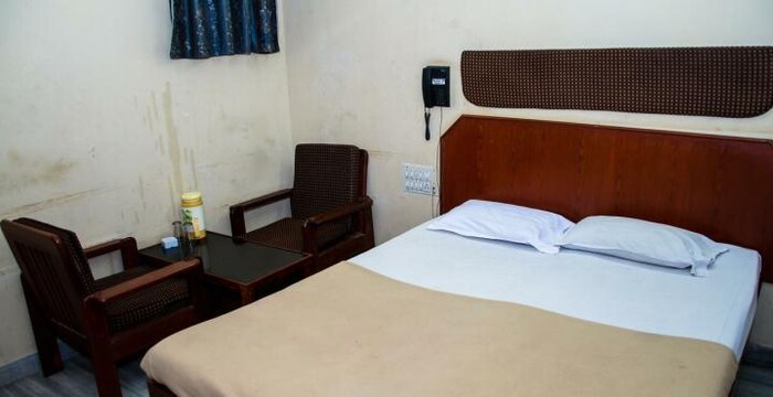 Sri Sai Residency-Deluxe AC Bedroom1