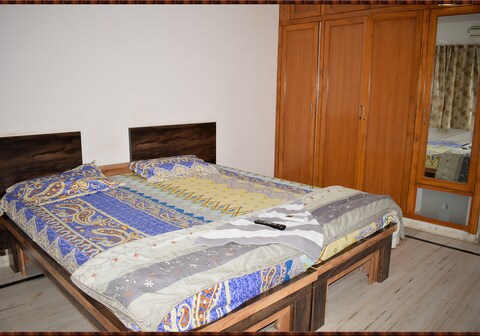 Home Touch Service Apartment | Rooms & Caretaker