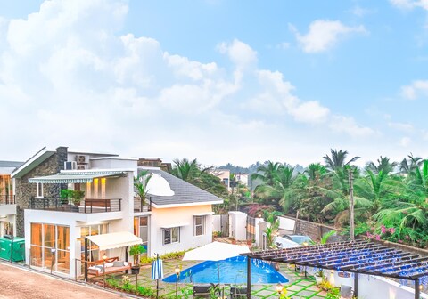 ELIVAAS Moonlit retreat 3 BHK with Garden & Pool