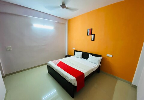 Hotel O Happy Stay Near Iskcon Temple Noida