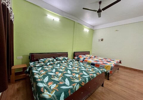 ABC Midtown Home - 1BHK with AC bedroom & kitchen