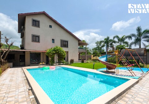 StayVista at Dusk by the hills