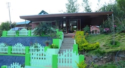 Family Care Homestay (Deluxe Room), Munnar Family Care Homestay (Deluxe Room), Munnar