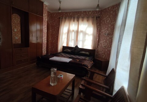 Redhouse near Dal Lake