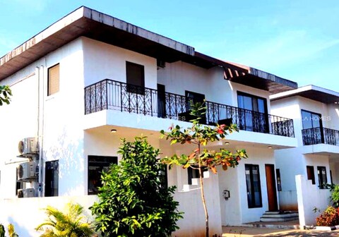 Spanish inspired 3BHK White Villa Brinla Homes