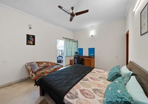 Urban Escape Master Bedroom With Private StudyArea